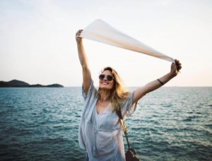 woman by the ocean enjoying recovery