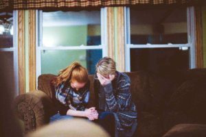 Family crying over drug overdose