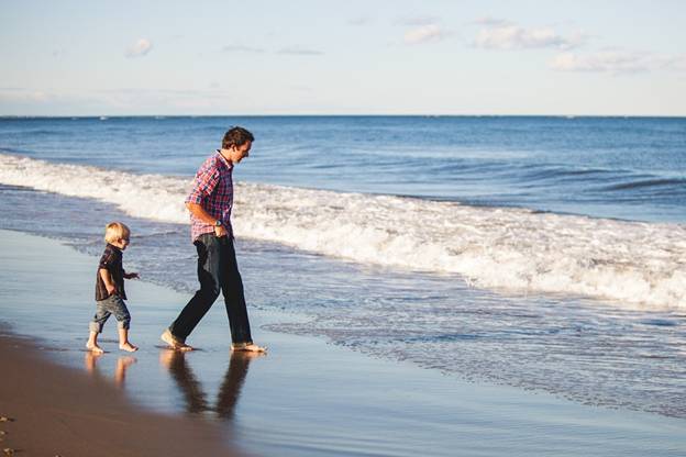 man enjoying with son