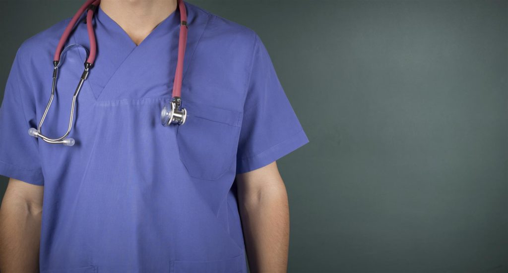 male doctor with stethoscope