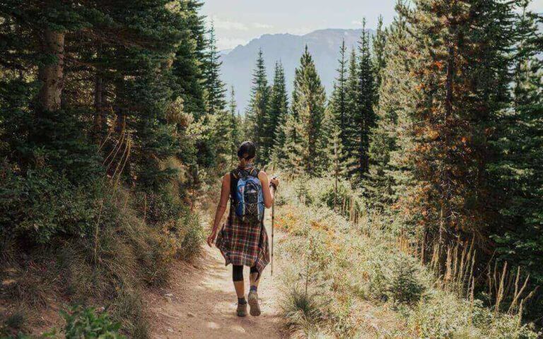 women trekking in the forest