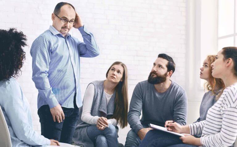 man in aa meeting