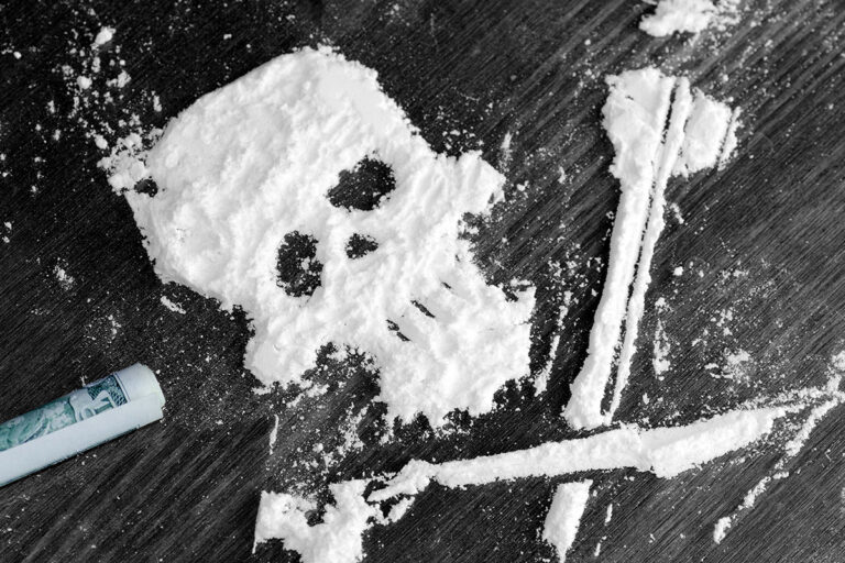 cocaine in the shape of a skull and cross bones. is cocaine harmful?