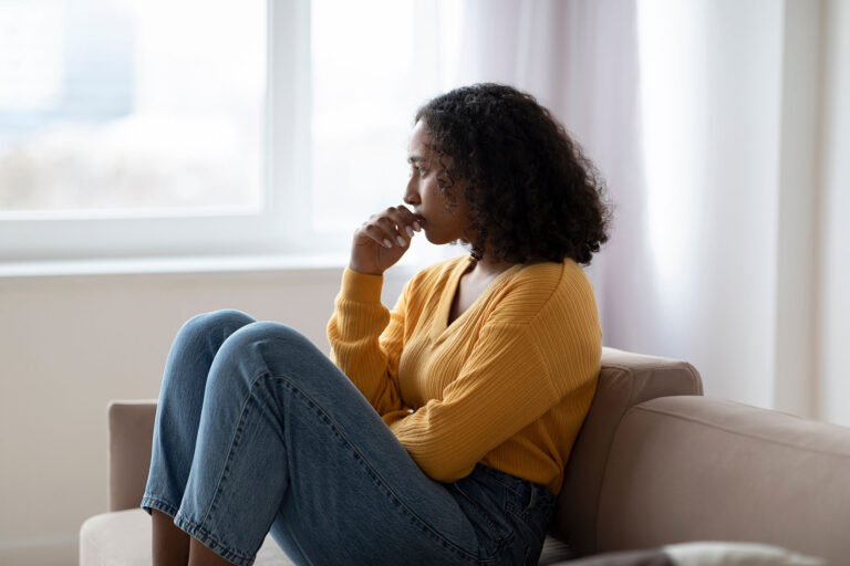 Person sitting and wondering what the stages of addiction are