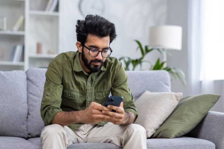 Person sitting on couch, wondering if gabapentin is addictive